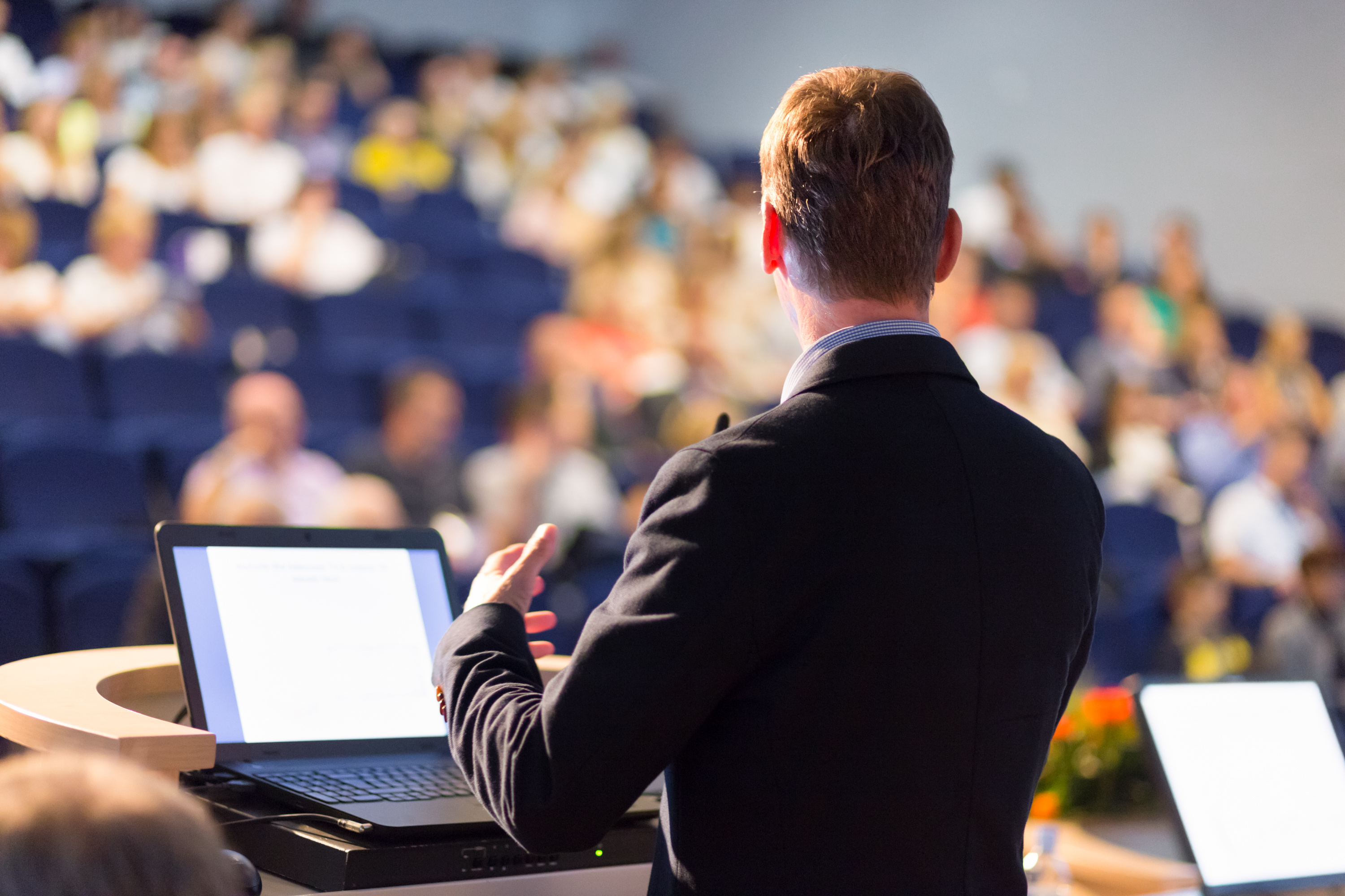 Speaker at Business Conference and Presentation.